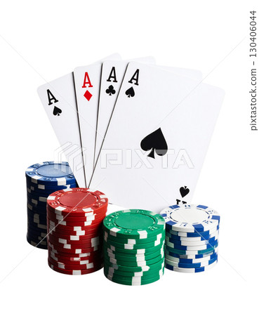 Poker cards and winning chips, including the Ace of Spades, on a white background. 130406044