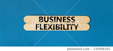 Business flexibility symbol. Concept words Business flexibility on beautiful wooden stick. Beautiful blue paper background. Business flexibility concept. Copy space. 130406301