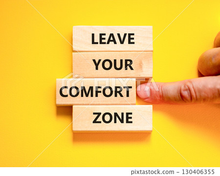 Leave your comfort zone symbol. Concept words Leave your comfort zone on beautiful wooden blocks. Beautiful yellow paper background. Business psychological Leave your comfort zone concept. Copy space. Leave your comfort zone symbol. Concept words Leave your comfort zone on beautiful wooden blocks. Beautiful yellow paper background. Business psychological Leave your comfort zone concept. Copy space. 130406355
