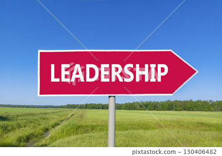 Leadership symbol. Concept word Leadership on beautiful red road sign. Beautiful blue sky green grass and forest peaceful nature background. Business leadership concept. Copy space. Leadership symbol. Concept word Leadership on beautiful red road sign. Beautiful blue sky green grass and forest peaceful nature background. Business leadership concept. Copy space. 130406482