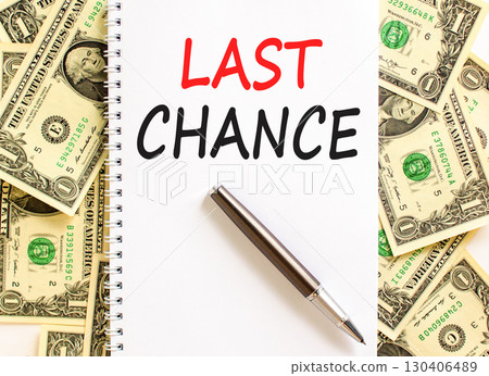 Last chance symbol. Concept word Last chance on beautiful white note. Dollar bills. Beautiful dollar bills background. Black pen. Business last chance concept. Copy space. Last chance symbol. Concept word Last chance on beautiful white note. Dollar bills. Beautiful dollar bills background. Black pen. Business last chance concept. Copy space. 130406489