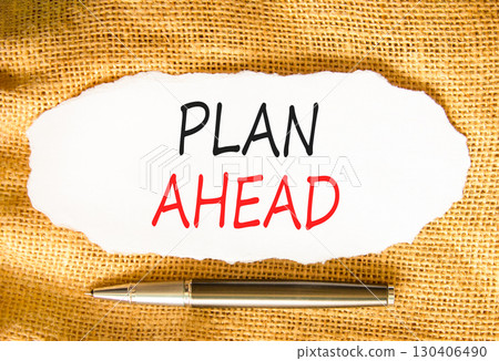 Plan ahead symbol. Concept word Plan ahead on beautiful white paper. Beautiful canvas background. Black pen. Business plan ahead concept. Copy space. 130406490