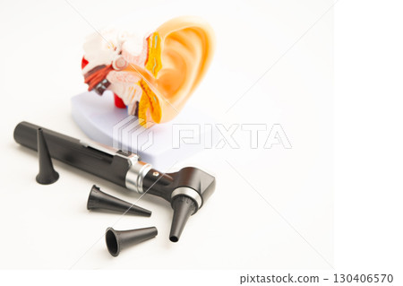 Otoscope with model for audiologist or ENT doctor use otoscope checking ear and treat hearing loss problem. 130406570