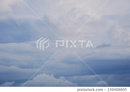 A series of low-contrast gray clouds that look like a watercolor painting. A summery cloud and sky background material. A series of low-contrast gray clouds that look like a watercolor painting. A summery cloud and sky background material. 130406605