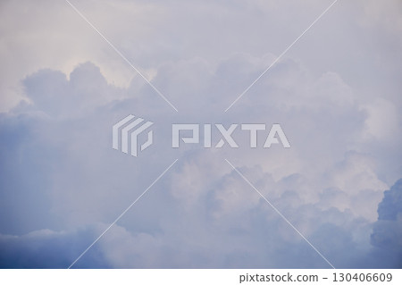 A series of low-contrast gray clouds that look like a watercolor painting. A summery cloud and sky background material. A series of low-contrast gray clouds that look like a watercolor painting. A summery cloud and sky background material. 130406609