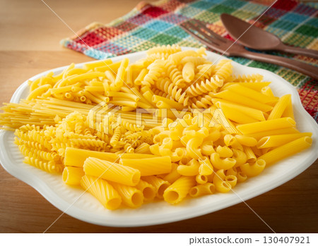 Various macaroni, various types of pasta, carbohydrates 130407921