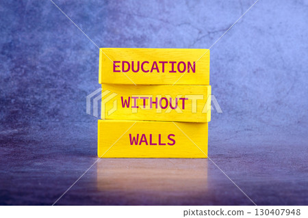 Copy space; Concept words EDUCATION WITHOUT WALLS on wooden blocks on a bright background Copy space; Concept words EDUCATION WITHOUT WALLS on wooden blocks on a bright background 130407948