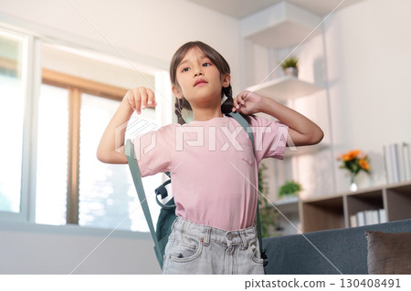 Child wearing backpack, ready for school Child wearing backpack, ready for school 130408491