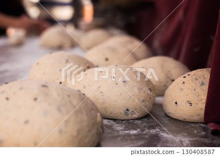 bread preparation. loaves of dough before baking 130408587
