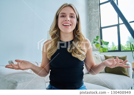Web cam view of young woman talking looking in camera, online meeting, video call Web cam view of young woman talking looking in camera, online meeting, video call 130408949