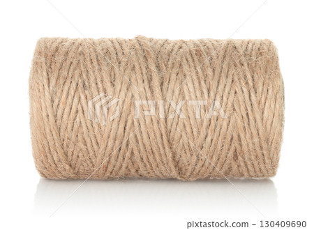 Jute burlap twine spool isolated on transparent background. Natural fiber for eco and zero waste packaging, craft and DIY, gardening, rustic decor and branding mockup. Full focus photo 130409690