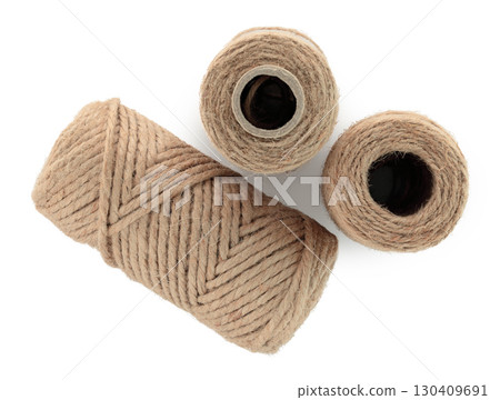 Jute burlap twine spool isolated on transparent background. Natural fiber for eco and zero waste packaging, craft and DIY, gardening, rustic decor and branding mockup. Full focus photo 130409691