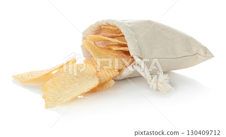 Cotton fabric bag filled with potato chips isolated on transparent background. Eco friendly zero waste packaging for snack food, fast food and junk food concept. Full focus photo Cotton fabric bag filled with potato chips isolated on transparent background. Eco friendly zero waste packaging for snack food, fast food and junk food concept. Full focus photo 130409712