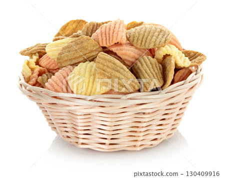 Woven small plate with vegetable chips, isolated on transparent background, full focus stacking for sharp texture and clear detail Woven small plate with vegetable chips, isolated on transparent background, full focus stacking for sharp texture and clear detail 130409916