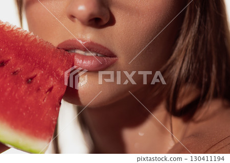 Close up lips touching watermelon slice fresh vitality Close up lips touching watermelon slice fresh vitality 130411194