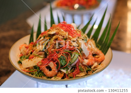 Healthy salad plate. Fresh seafood recipe. Grilled shrimps and fresh vegetable salad and egg. Grilled prawns. Healthy food. Flat lay. Top view 130411255