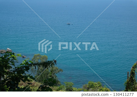 Calm blue ocean sea waves in sunny day. Tropical seascape horizon. Nature background. 130411277