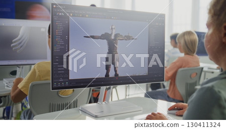 Smart Young Girl Using Computer, Creating Game Character, Practicing 3D Modeling 130411324