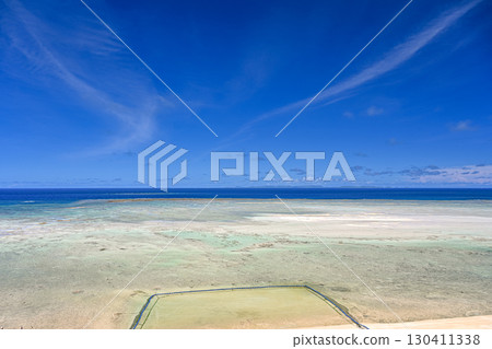 Beautiful, crystal clear waters photographed on the private beach of a luxury resort hotel in Okinawa [Okinawa Landscape] 130411338