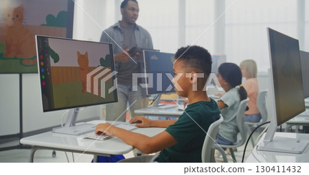Elementary School Children Using Computers, Creating Digital Illustrations During Digital Art Lesson 130411432