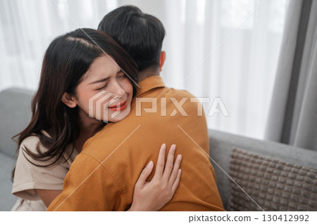 Emotional Embrace Comforting Moments Shared Between Two Loved Ones in Life 130412992
