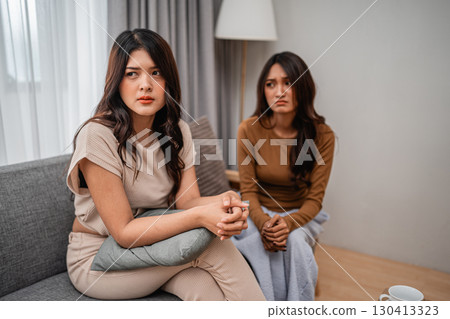 An Emotional and Touching Conversation Between Two Women in a Cozy Modern Living Room An Emotional and Touching Conversation Between Two Women in a Cozy Modern Living Room 130413323
