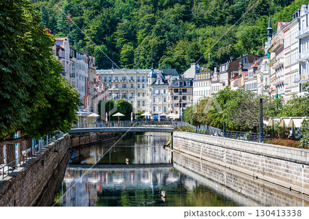 Summer walk through the spa center of the famous Karlovy Vary (Carlsbad) in the Czech Republic 130413338
