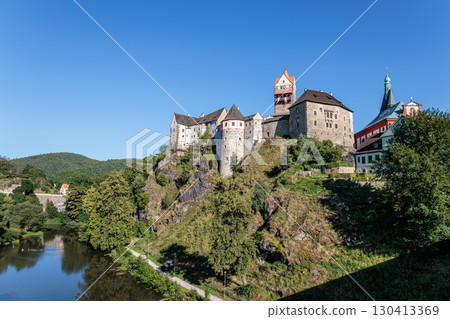 Medieval Loket Castle above the village of Loket in the Czech Republic Medieval Loket Castle above the village of Loket in the Czech Republic 130413369