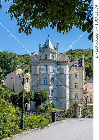 Summer walk through the spa center of the famous Karlovy Vary (Carlsbad) in the Czech Republic 130413374