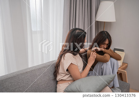 Comforting Moments Two Close Friends Share Deep Emotions Together in Their Home Comforting Moments Two Close Friends Share Deep Emotions Together in Their Home 130413376