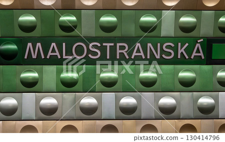 Prague, Czech Republic, August 6, 2023. Malostranska metro station, futuristic colored aluminum design with the station sign. Public transport. 130414796