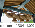 The large shimenawa rope at Izumo Taisha Shrine in Shimane Prefecture, seen from under the roof of the Kagura Hall 130414809