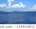 View of the city of Matsue across Lake Shinji in Shimane Prefecture and white clouds floating in the blue sky [close-up] 130414812