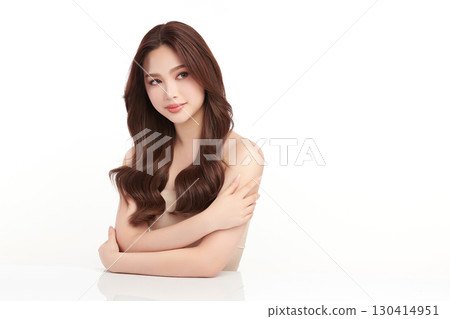A beautiful young Asian woman with clean, fresh skin against a white background. Skincare, facial treatment, cosmetology, beauty, and spa. An elegant portrait of an Asian woman. A beautiful young Asian woman with clean, fresh skin against a white background. Skincare, facial treatment, cosmetology, beauty, and spa. An elegant portrait of an Asian woman. 130414951