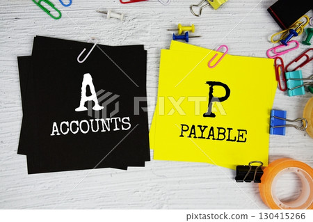 AP - Accounts Payable text on stick note with stationery on concrete background AP - Accounts Payable text on stick note with stationery on concrete background 130415266