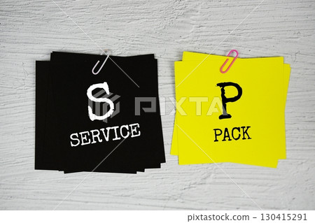 SP - Service Pack text on stick note on concrete background SP - Service Pack text on stick note on concrete background 130415291