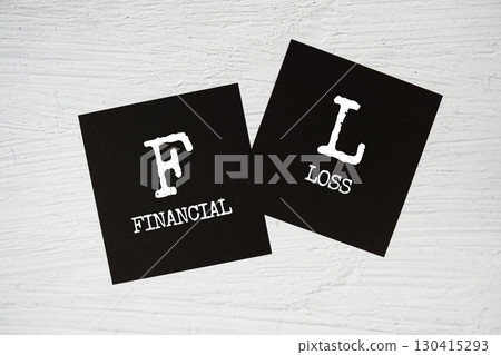 FL - Financial Loss text on stick note on concrete background FL - Financial Loss text on stick note on concrete background 130415293