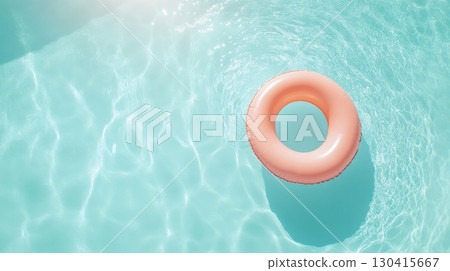 Floating on the tranquil surface of a turquoise swimming pool, an inflatable ring enhances a relaxing summer holiday scene, evoking feelings of leisure and carefree fun under the bright sun 130415667