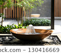 Minimalist round garden water fountain create calm and peaceful ambience	 130416669
