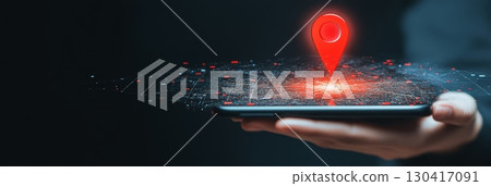Businessman holding mobile phone with futuristic red location pin hovering over digital map, representing innovative navigation technology and precise location tracking 130417091