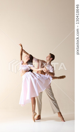 Ballet partners expressing artistic grace through elegant duet motion 130418646