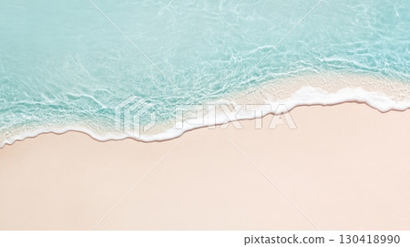 Soft waves of turquoise sea water gently washing over a golden sandy beach, creating a serene and idyllic atmosphere perfect for a relaxing summer holiday getaway 130418990