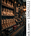 Shelves of vintage porcelain dolls and an antique model train in a charming old toy store. Nostalgic collection of classic childhood collectibles in a curiosity shop. 130420222