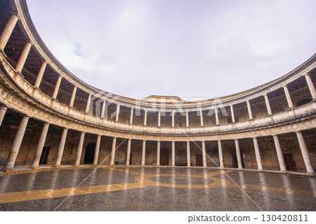 Circular Renaissance Palace of Charles V at Alhambra in Granada, Spain. Circular Renaissance Palace of Charles V at Alhambra in Granada, Spain. 130420811