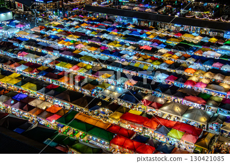 Colorful food stall village at night 130421085