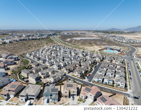 New development real estate. Aerial view of residential houses and driveways neighborhood in south San Diego, Chula Vista New development real estate. Aerial view of residential houses and driveways neighborhood in south San Diego, Chula Vista 130421222