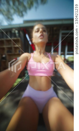 Participating in a Consistent Active Fitness Routine While Enjoying an Inviting Outdoor Gym Setting Participating in a Consistent Active Fitness Routine While Enjoying an Inviting Outdoor Gym Setting 130421259
