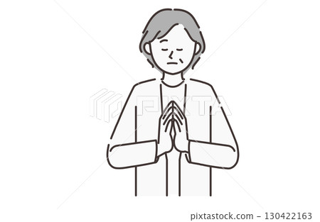 An elderly woman praying 130422163
