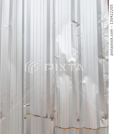 Wrinkled corrugated sheet background texture Wrinkled corrugated sheet background texture 130422205