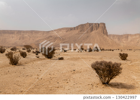 Rocky Desert Landscape with Plateau in Saudi Arabia Rocky Desert Landscape with Plateau in Saudi Arabia 130422997